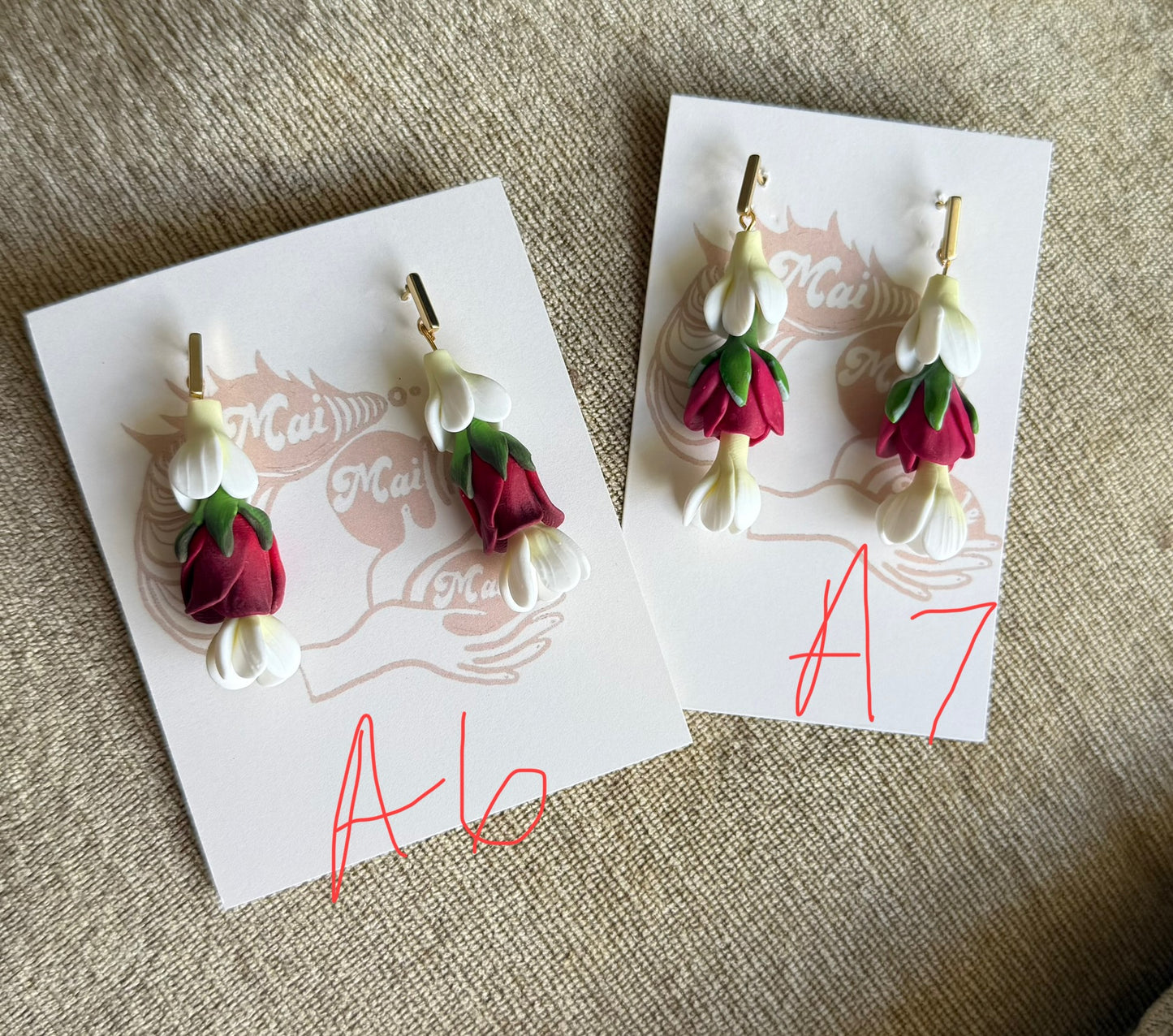 Triple Pua Drop Earrings